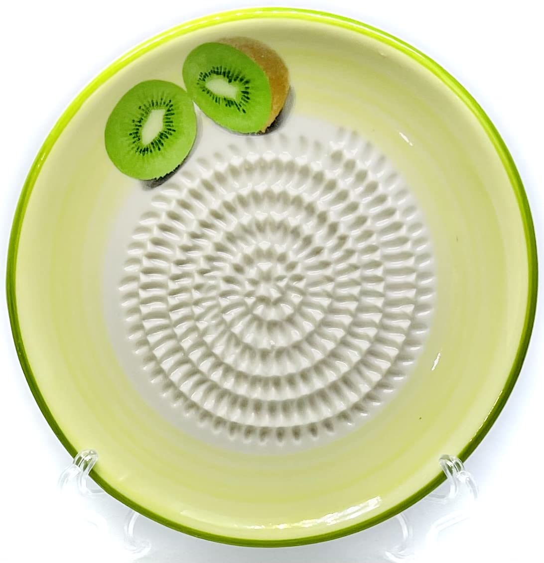 BonCera Kiwi design gathering brush cleans shredded bits from plate