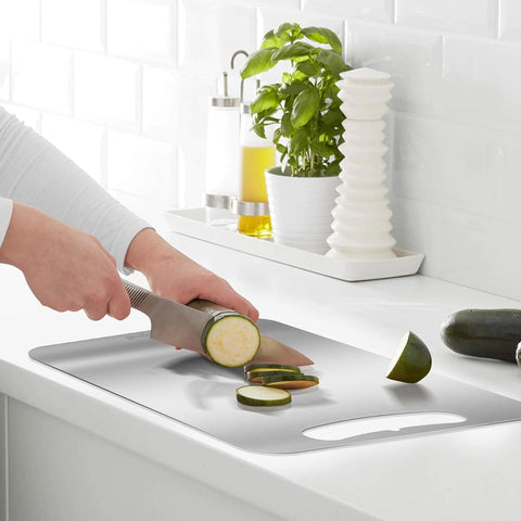 BOTUMIUY titanium cutting board set 3 stacks neatly for compact storage.