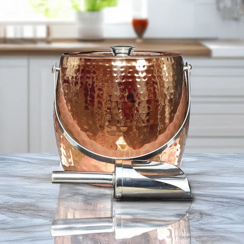 BREKX rose gold ice bucket on a home bar table setup