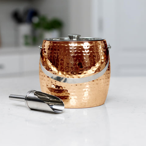 BREKX rose gold ice bucket holding wine bottle in ice