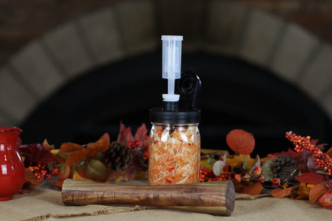 Brewing America fermentation tool in acacia wood for sturdy press.