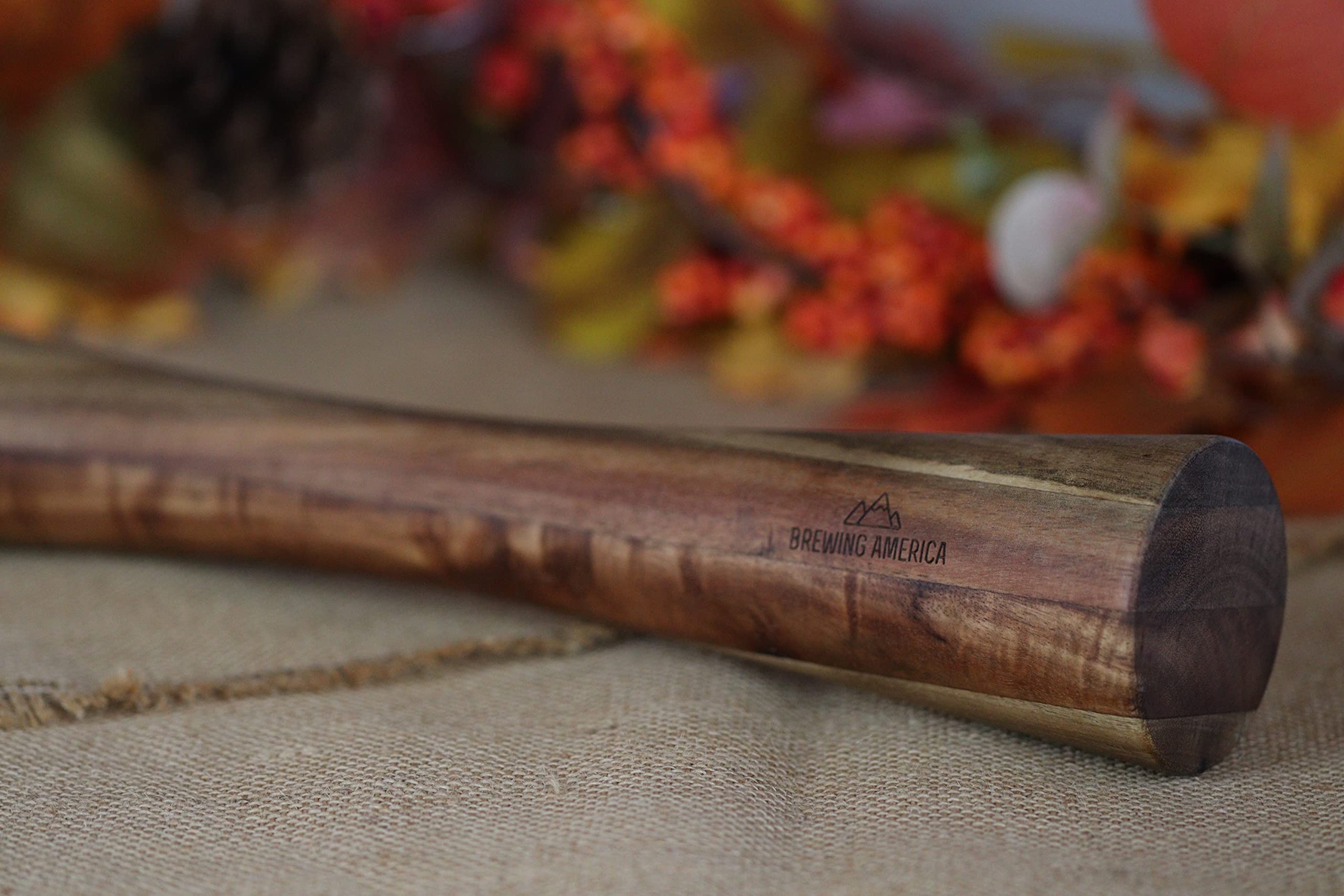 Brewing America acacia wood tamper wide-mouth ready for firm jar packing.