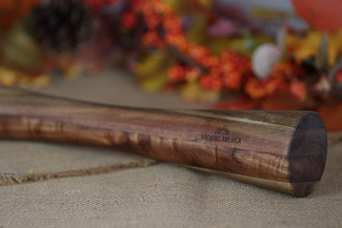 Brewing America acacia wood tamper wide-mouth ready for firm jar packing.