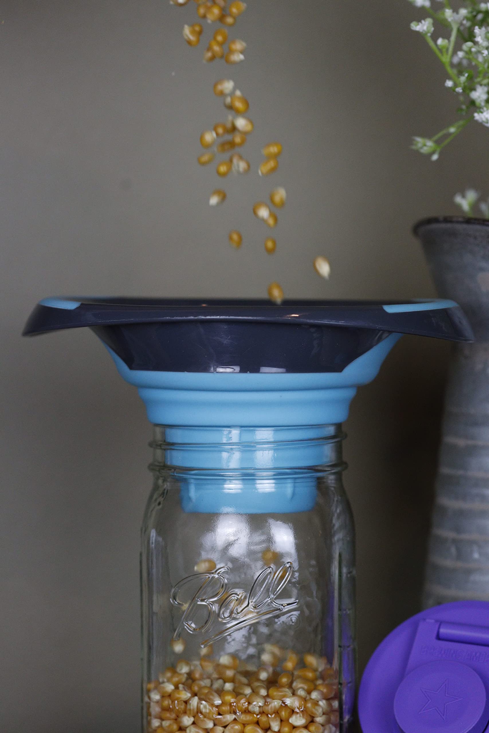 Brewing America silicone funnel standing on its own for stability.