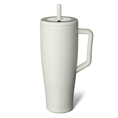 BrüMate Era 40 oz tumbler with handle and straw in dune keeps drinks cold on the go.