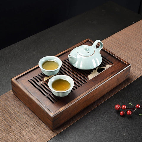 Bsigo Bamboo Tea Tray detachable surface simplifies disposal and cleaning after use.