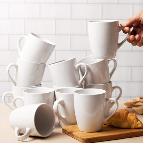 BTaT white mugs stacked to highlight minimalist design