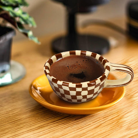 BuleVina checkered mug closeup glaze emphasizes craftsmanship and stain resistance.