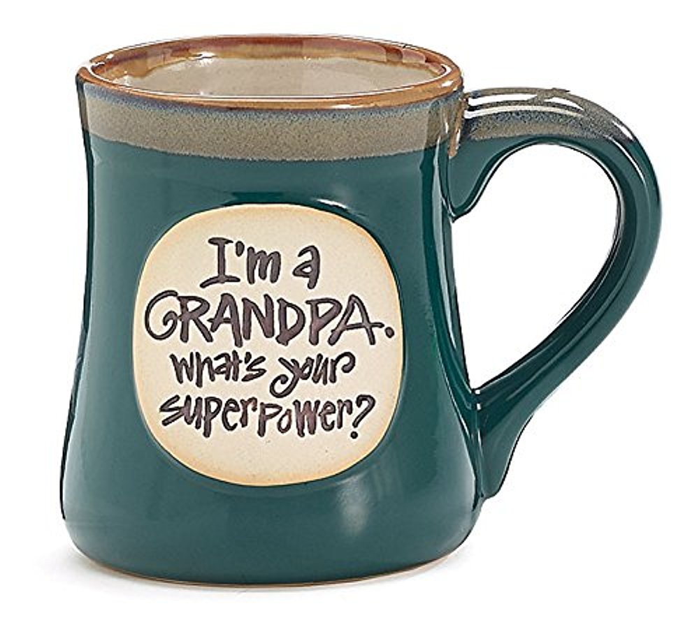 Burton+BURTON Grandpa Superpower ceramic mug, dark blue glaze with taupe rim, 18 oz capacity.