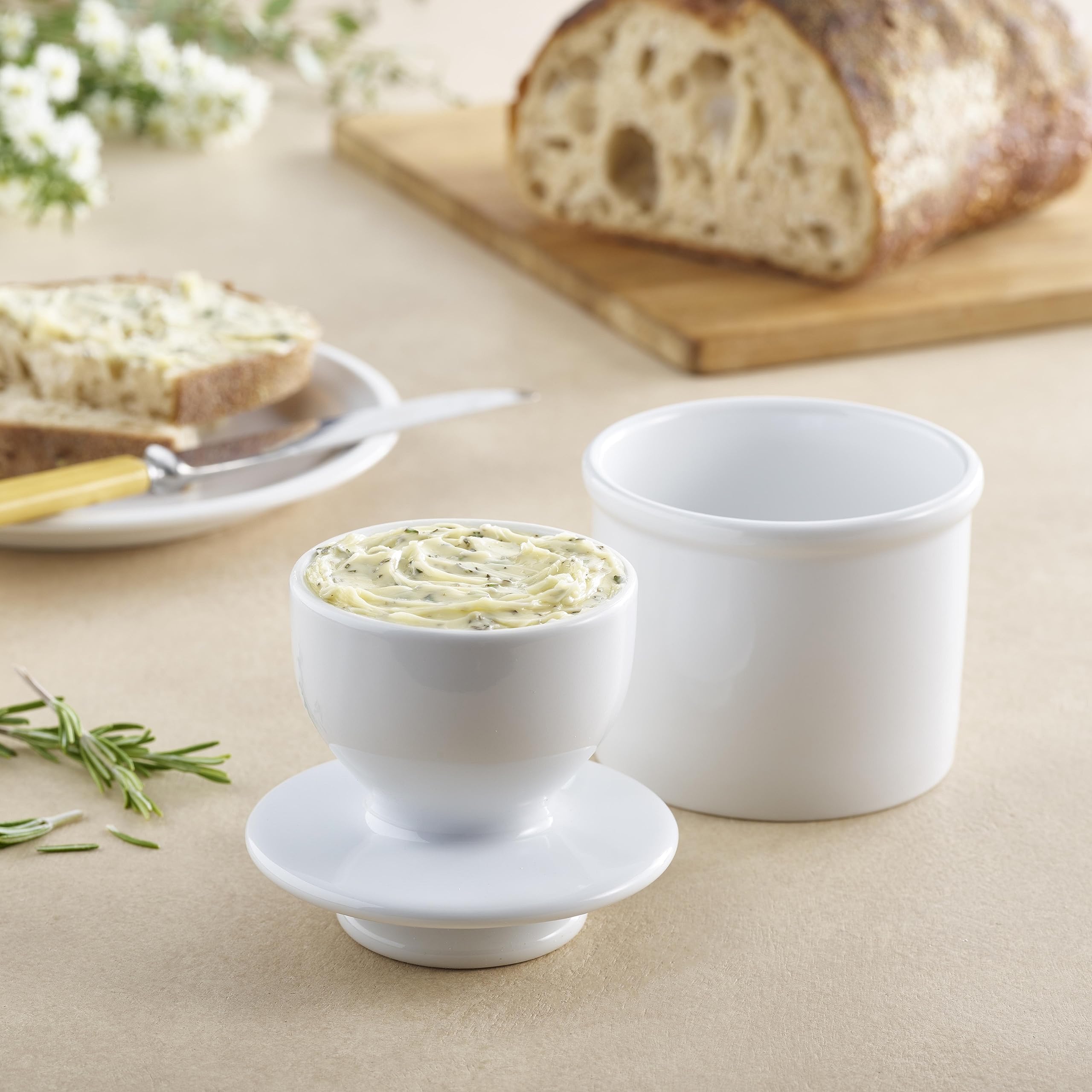 Butter Bell crock glossy white ceramic blends with kitchen decor for daily use.