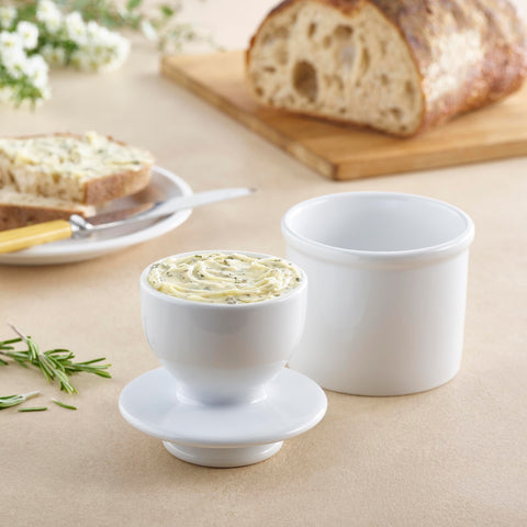 Butter Bell crock glossy white ceramic blends with kitchen decor for daily use.