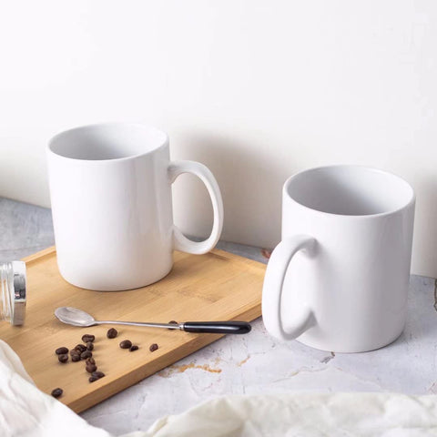 BYCNZB white ceramic mug clean finish complements any decor.