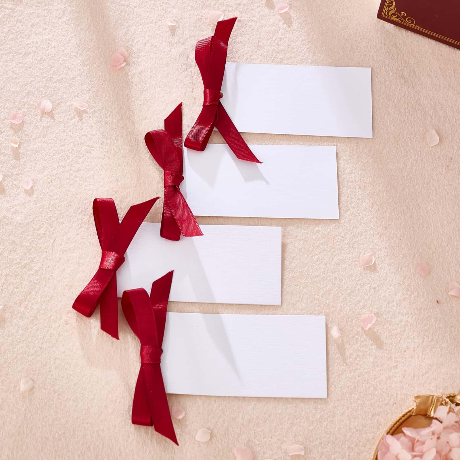 BZQCRT blank business cards with ribbons ready for writing.