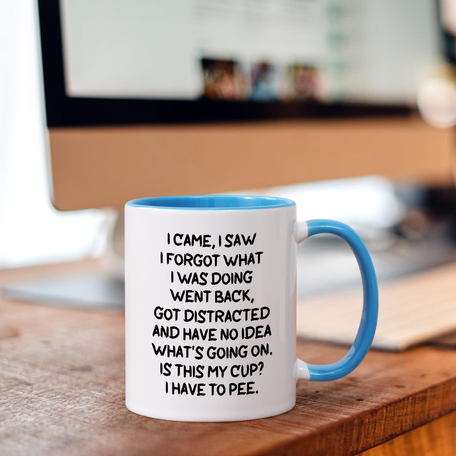 Cabtnca mug with ergonomic handle offers a comfortable grip during quick tea breaks.
