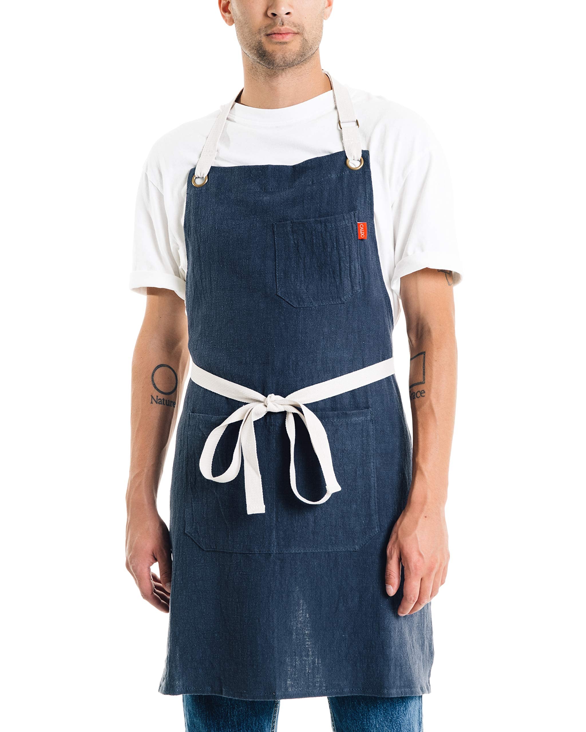 Caldo linen kitchen apron navy front view shows durable fabric and convenient pockets