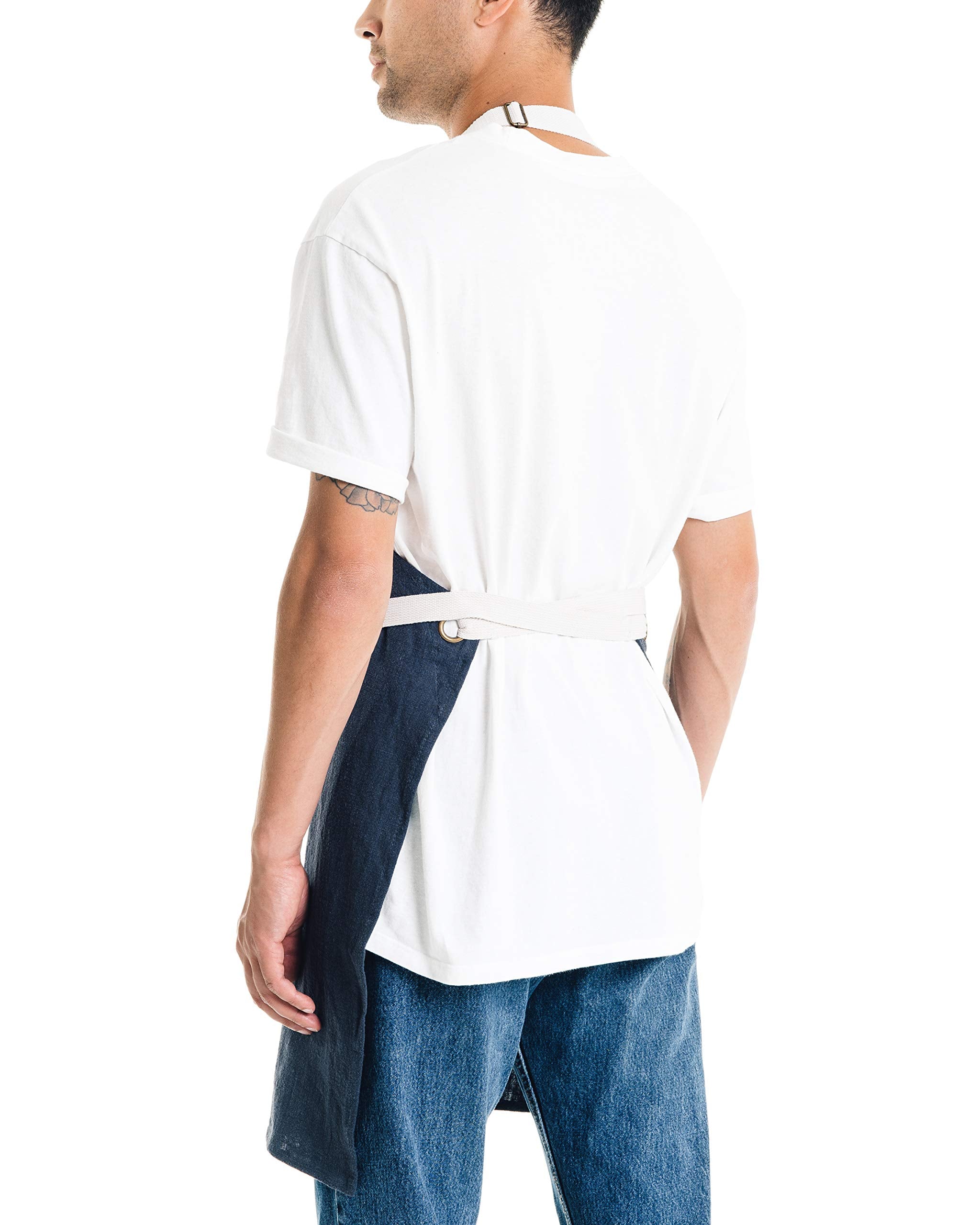 Caldo linen kitchen apron navy pocket detail highlights tool-ready storage