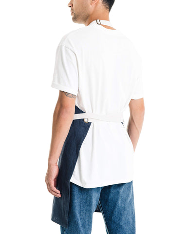 Caldo linen kitchen apron navy pocket detail highlights tool-ready storage