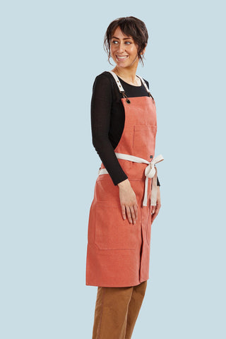 Caldo Split Leg Apron Terracotta pocket detail with three utility pockets for tools