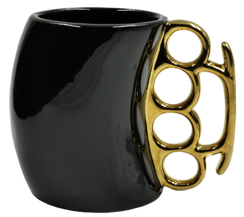 Caliber Gourmet brass knuckles cup in black and gold, bold ceramic mug for collectors.