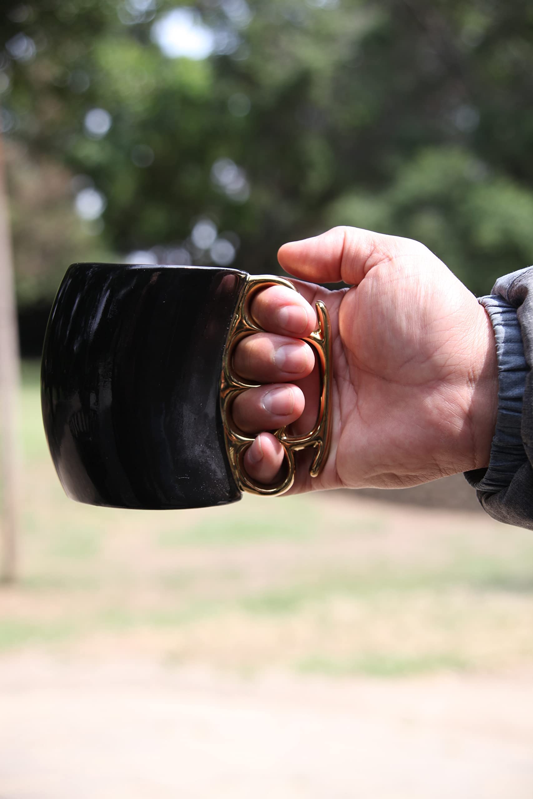 Caliber Gourmet brass knuckles cup unique design ideal for novelty coffee moments.