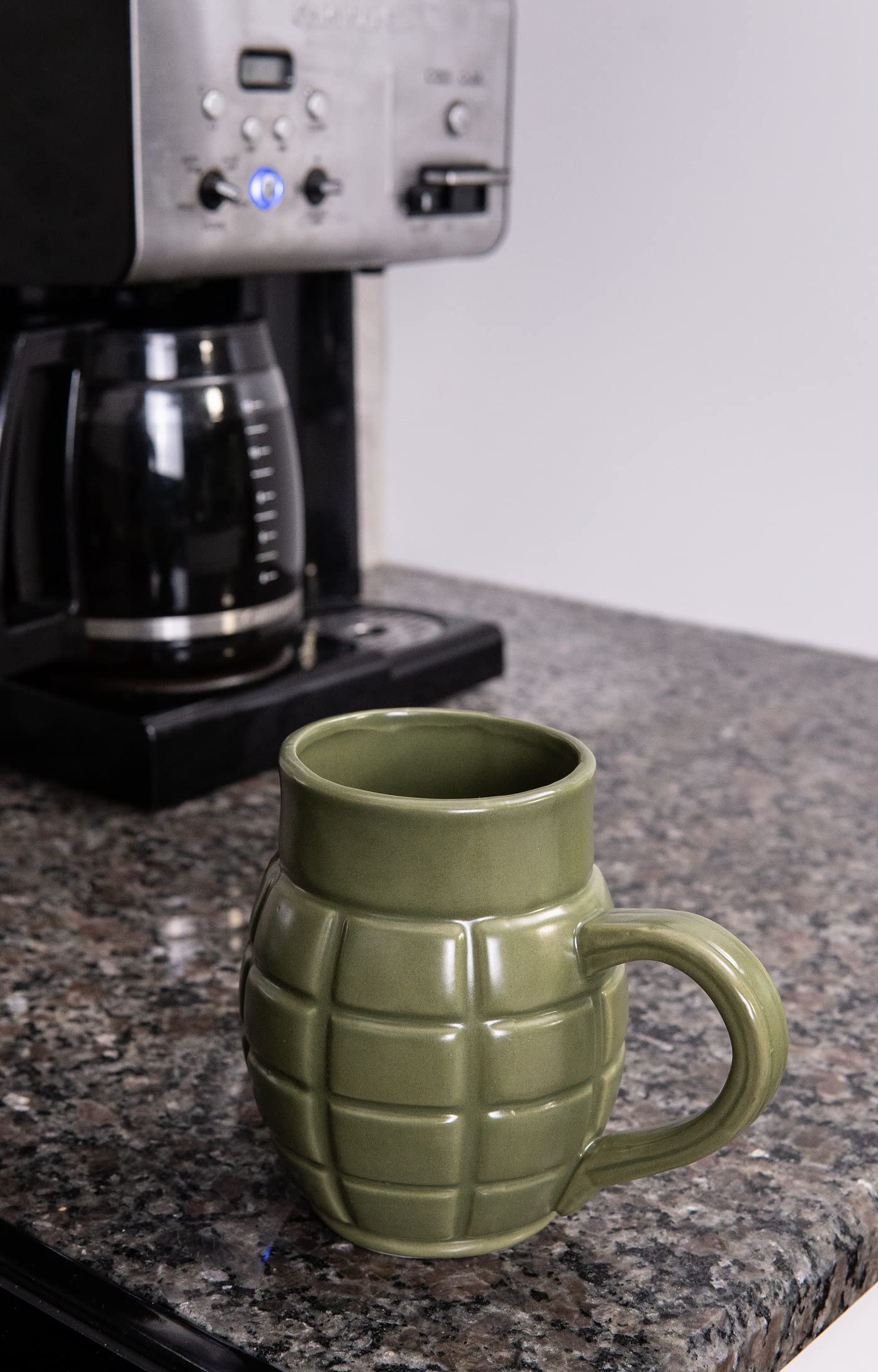 Caliber Gourmet Green Grenade mug, collectible design for fans of unique drinkware.