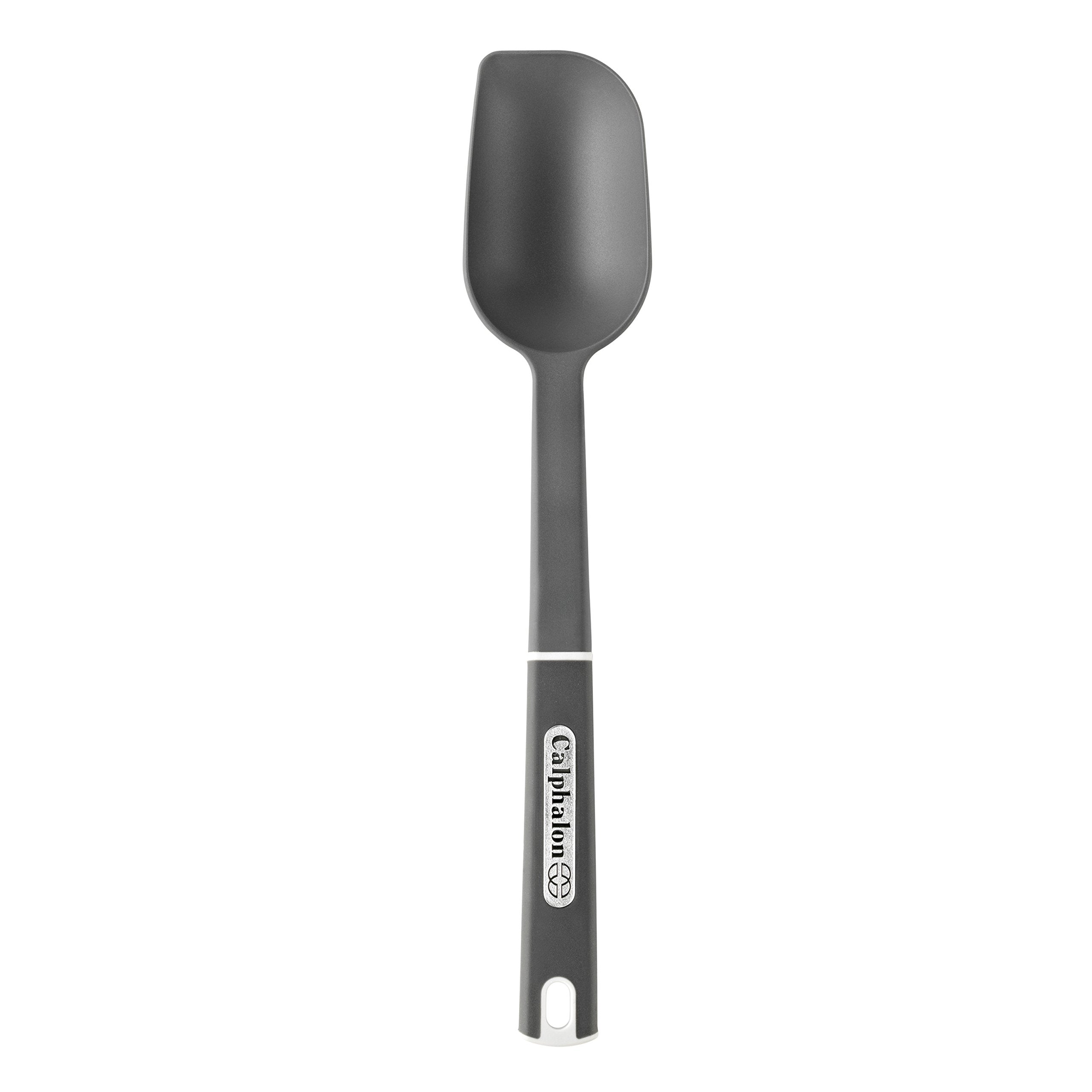 Calphalon nylon solid spoon large with flat edge for scraping pans and stirring sauces.