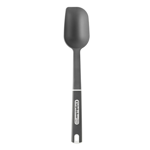 Calphalon nylon solid spoon large with flat edge for scraping pans and stirring sauces.