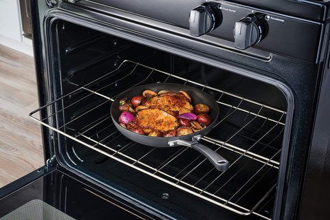 Calphalon stay-cool handle detail showing safety feature during stovetop use.