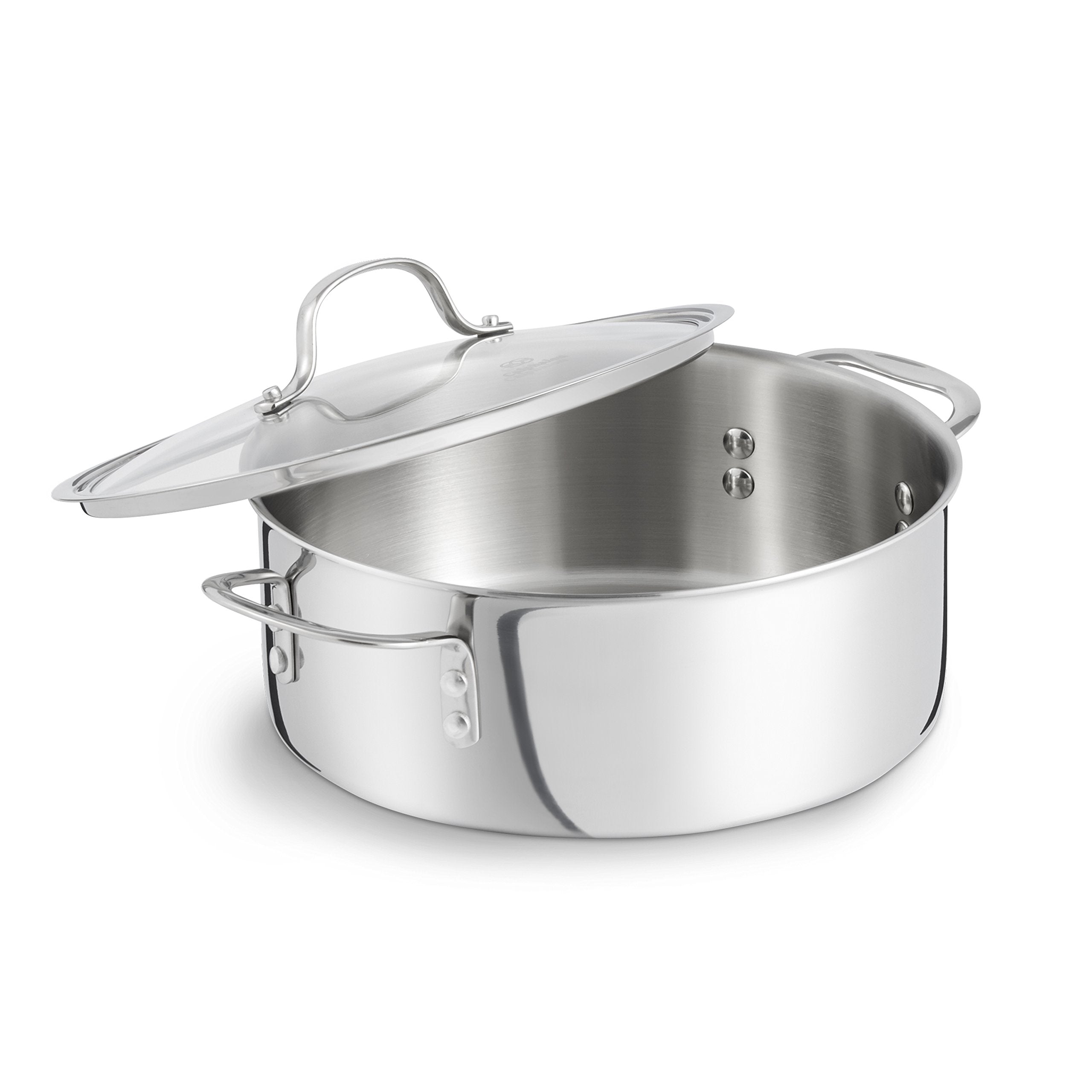 Calphalon Tri-Ply Dutch Oven with lid on for stove-to-table transfer.