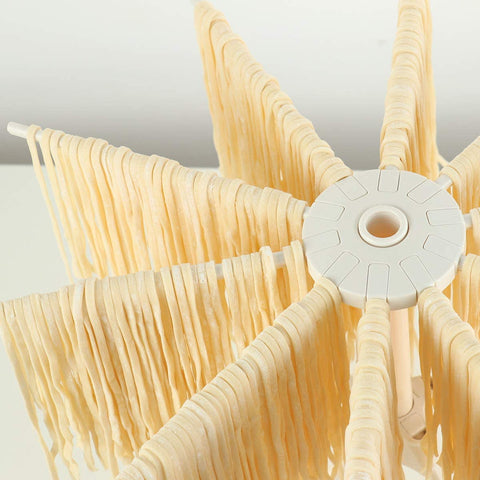 Cambom Pasta Drying Rack folded flat for compact kitchen storage.