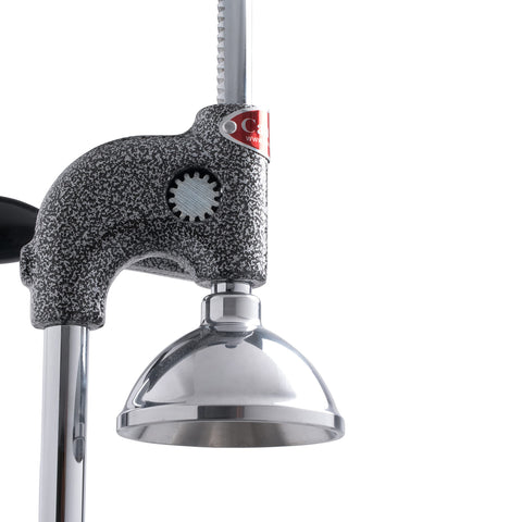 Can-Can juicer in operation delivering quick citrus extraction in a busy kitchen.