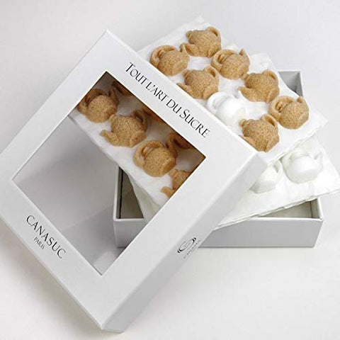 Canasuc amber and white teapot sugars showcased as a decorative gift box presentation.