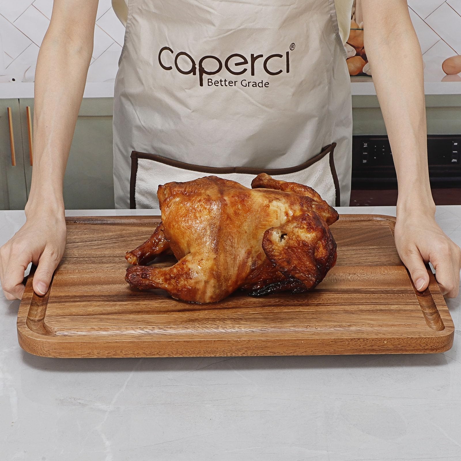 Caperci handled cutting board supports easy carrying from kitchen to table.