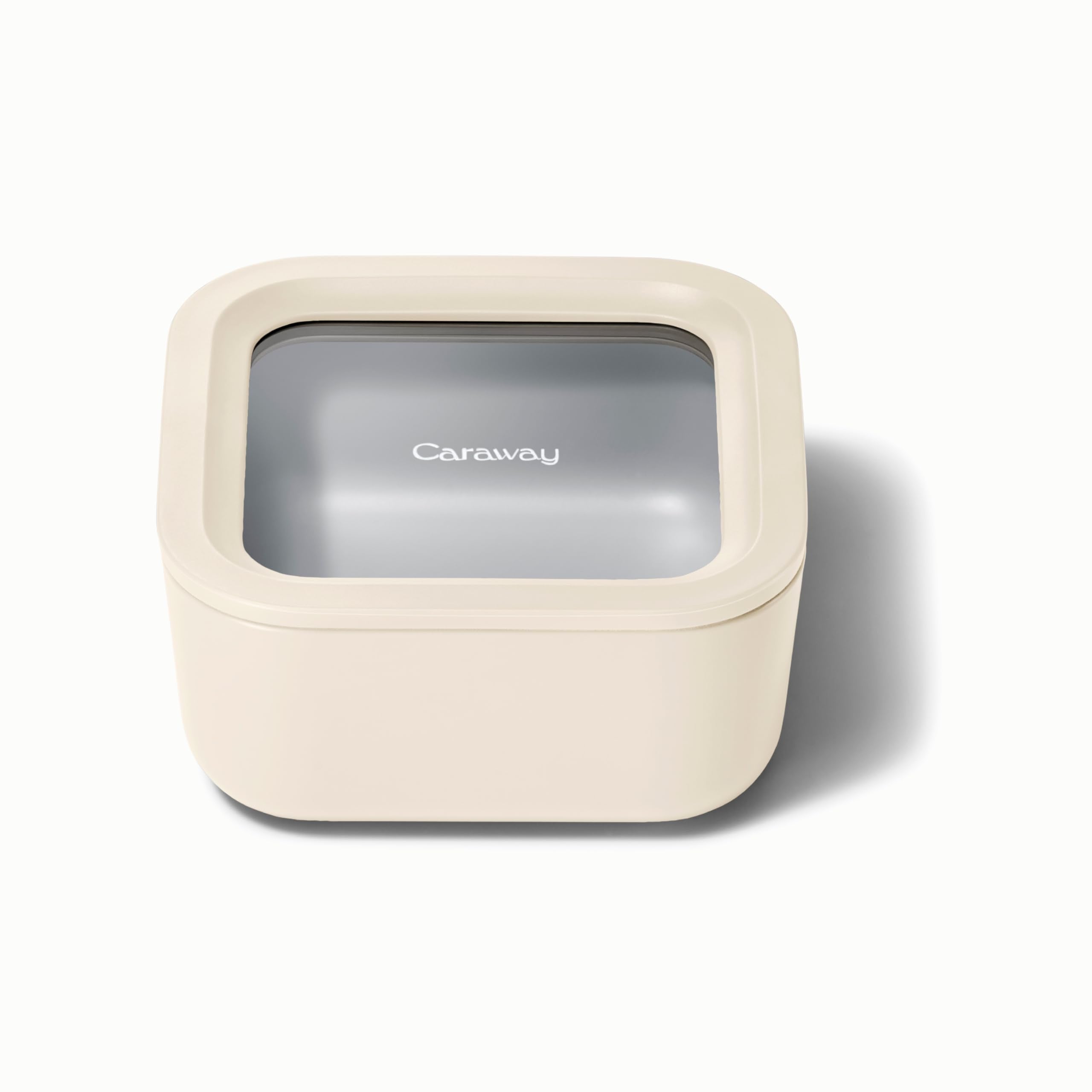 Caraway 4.4 cup glass container keeps leftovers fresh with a clear, stackable design.