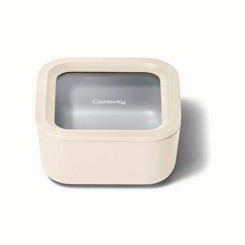 Caraway 4.4 cup glass container keeps leftovers fresh with a clear, stackable design.