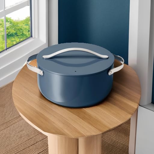 Caraway Dutch Oven compatible with gas, electric, and induction stovetops for flexible cooking.