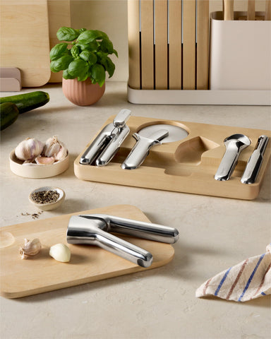 Caraway kitchen gadget set in use keeps tools organized during prep.