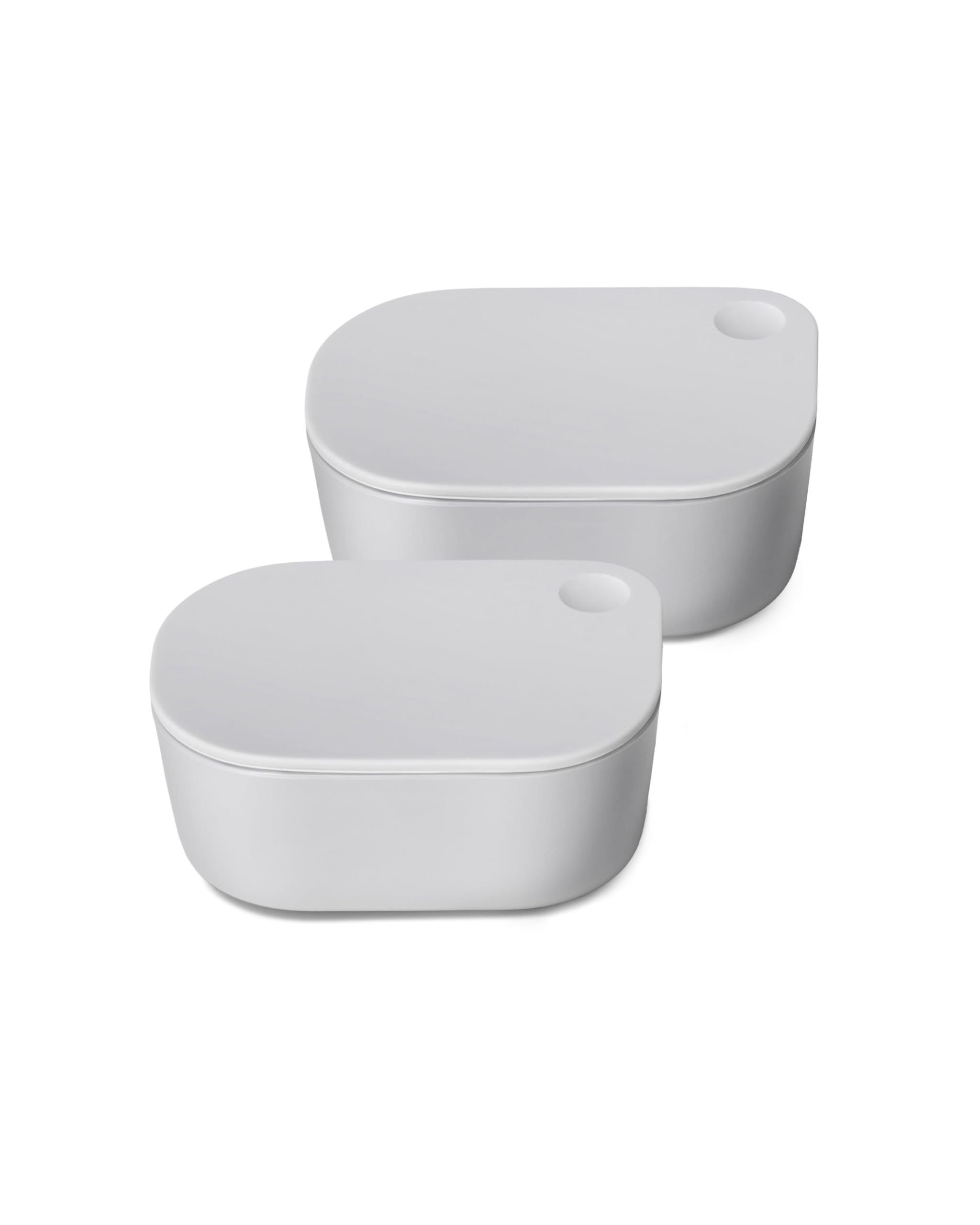 Caraway mini dash inserts with lids for organized lunches and sauces on the go.