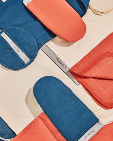Caraway oven mitts coordinating-collection-cream pair helps maintain a cohesive kitchen look.