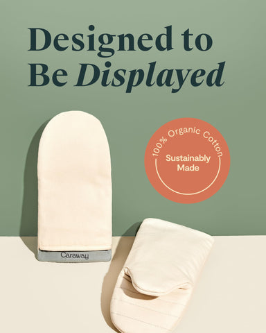 Caraway oven mitts cream featuring double-layer stitching for reliable heat protection.