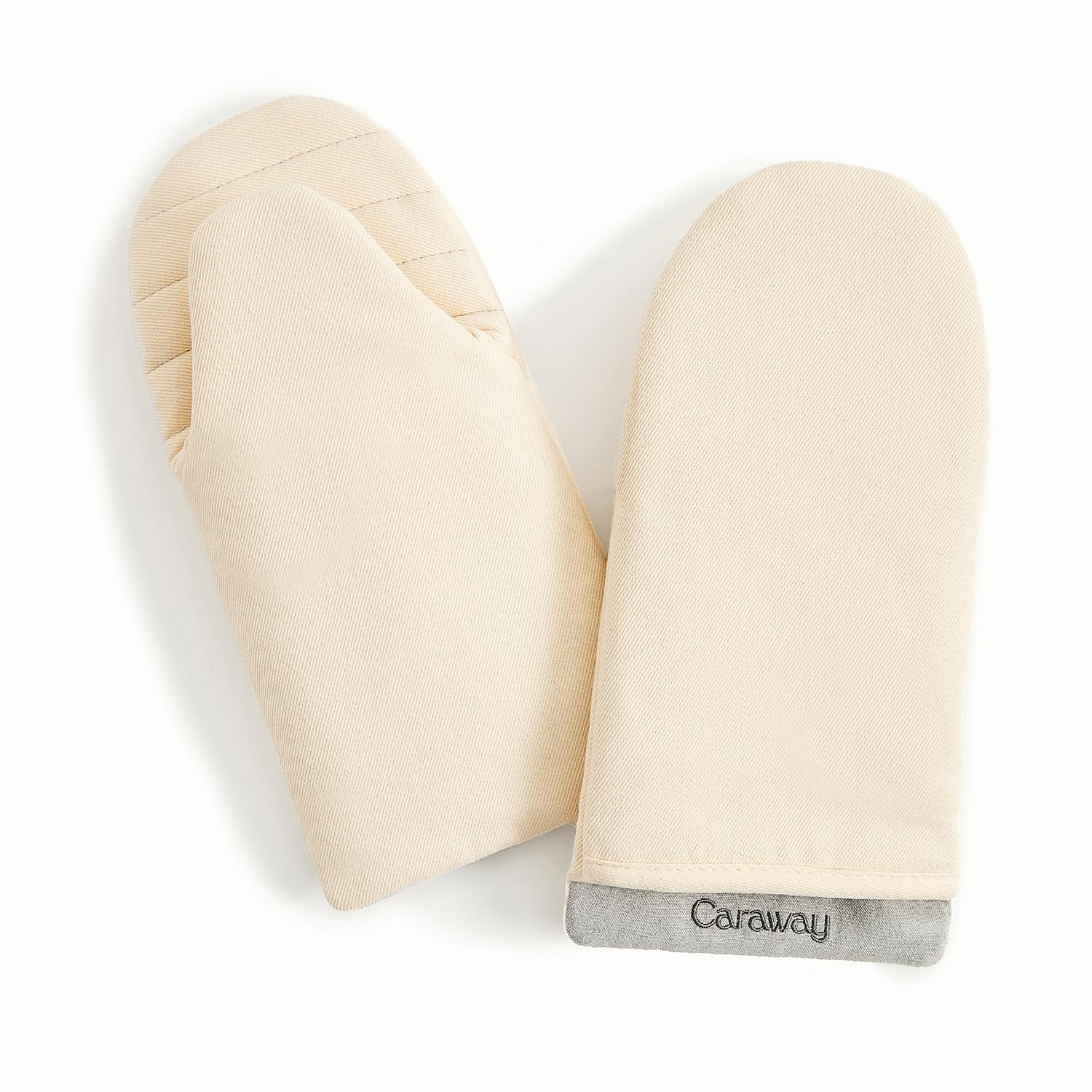 Caraway oven mitts cream with soft-organic-cotton-cream for a gentle grip while handling hot cookware.