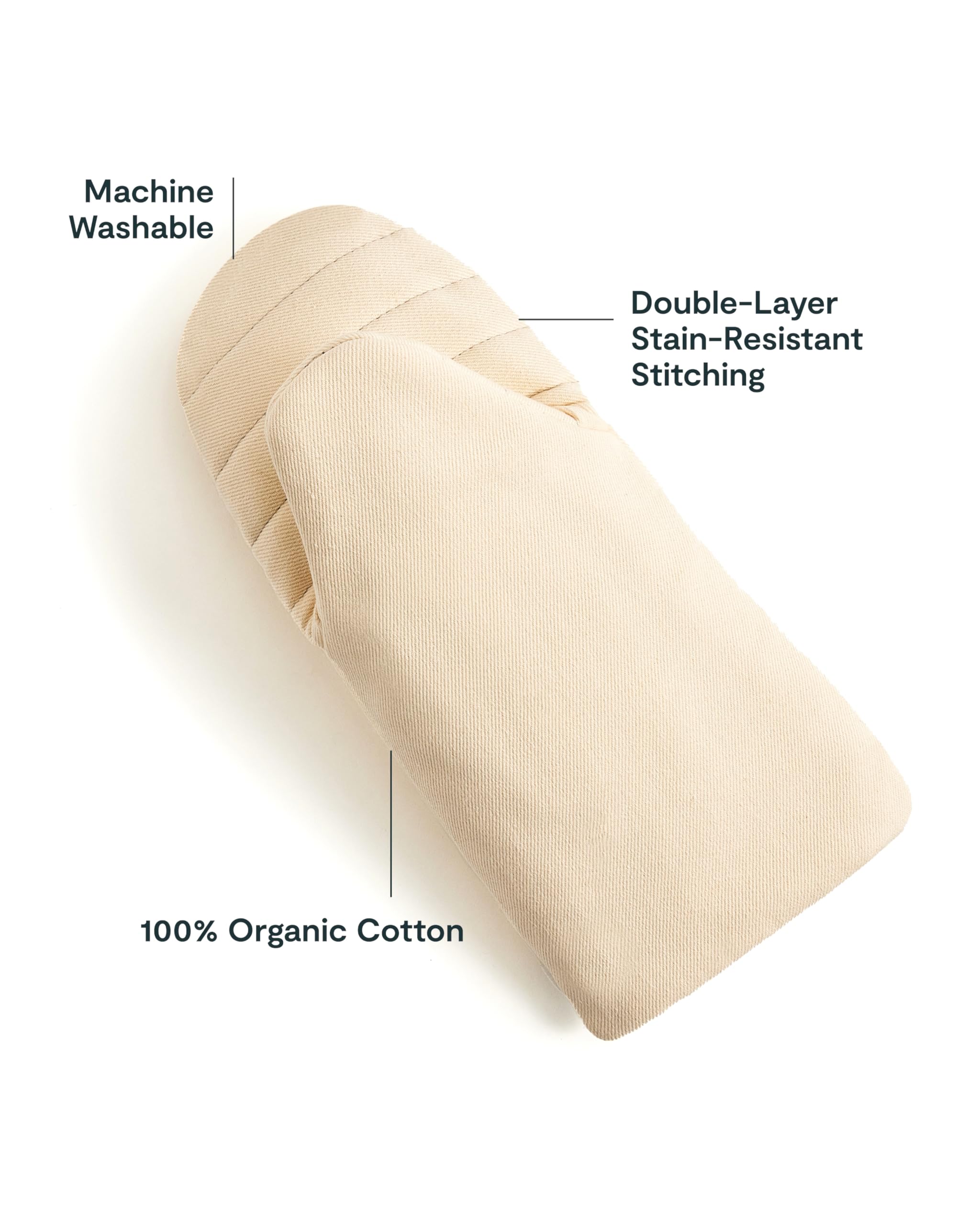 Caraway oven mitts cream show stain-resistant stitching for long-lasting kitchen use.