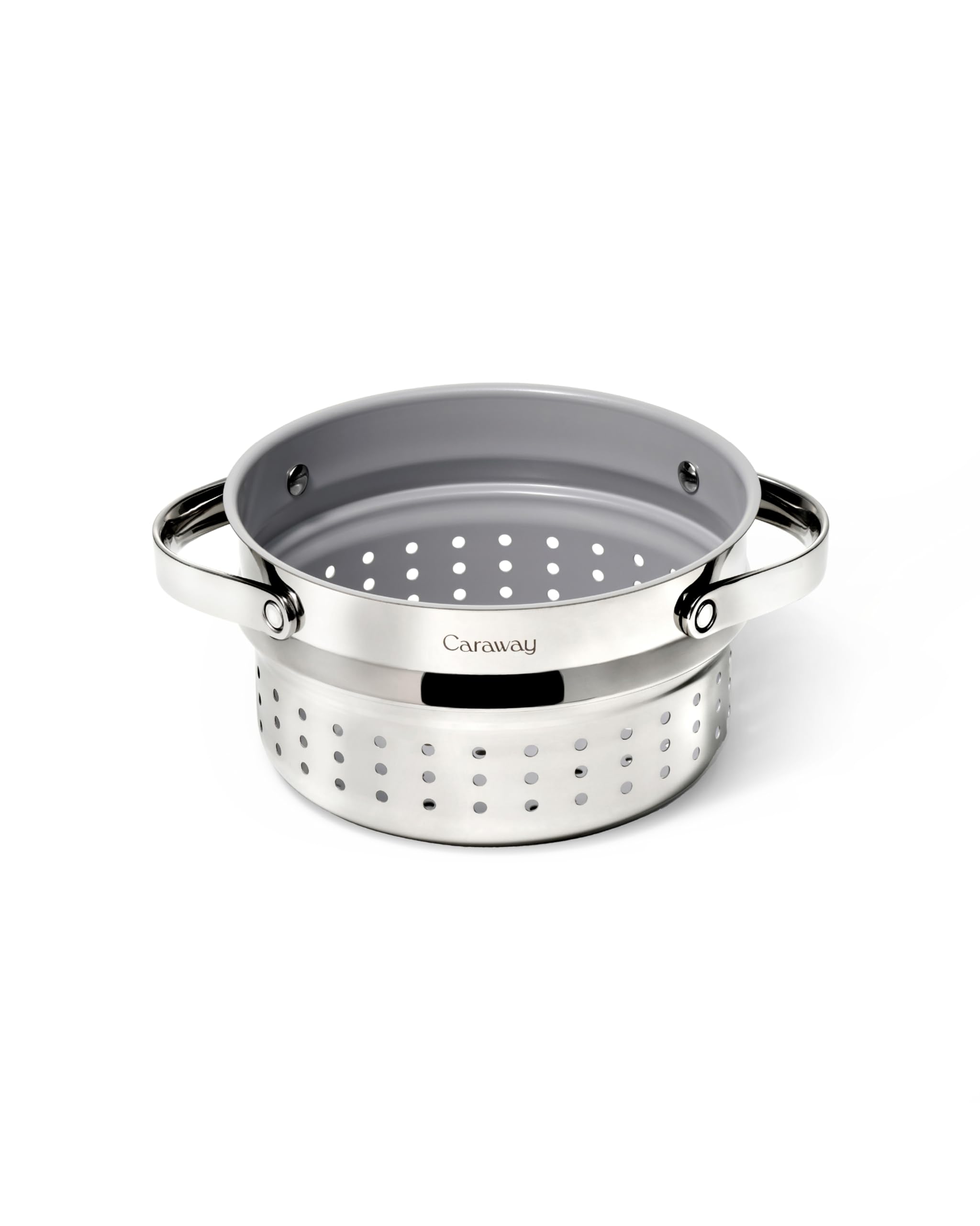 Caraway Steamer small inside sauce pan demonstrates compact, even veggie steaming at home.