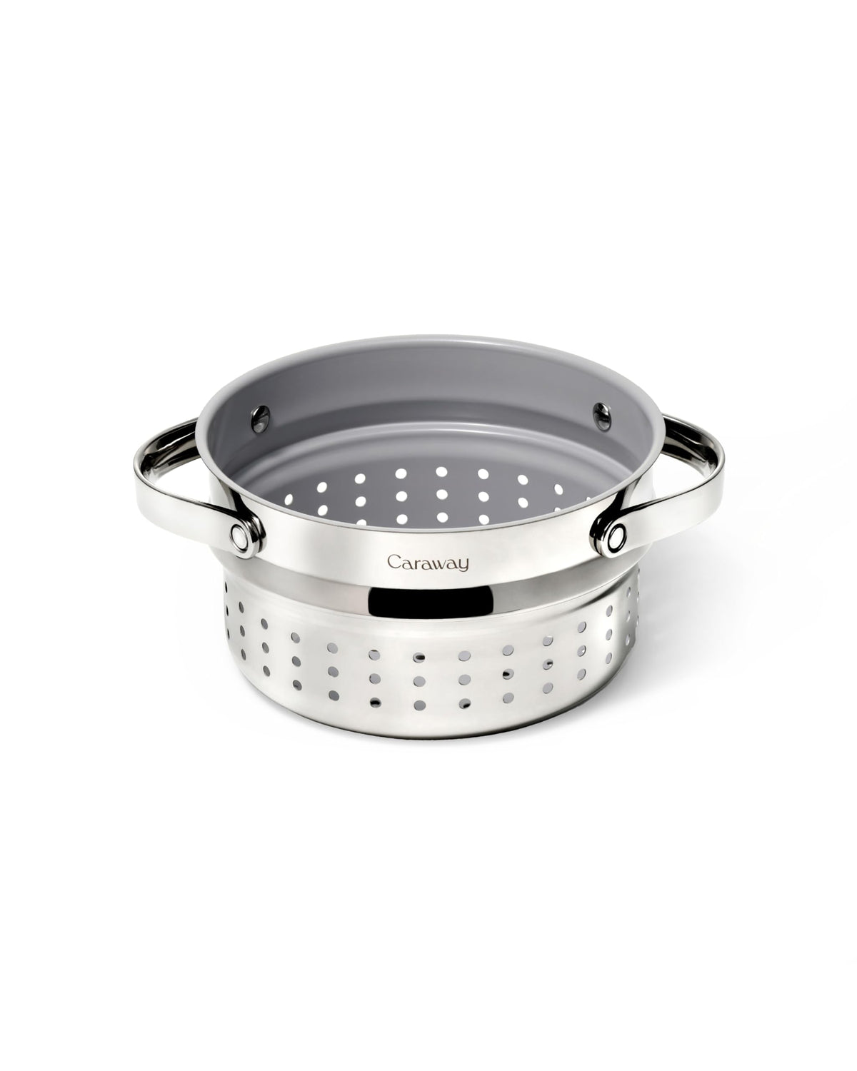 Caraway Steamer small inside sauce pan demonstrates compact, even veggie steaming at home.