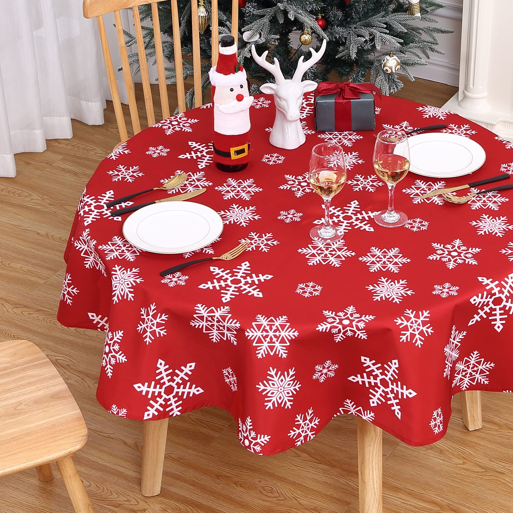 CAROMIO Christmas Tablecloth on dining or kitchen tables shields surfaces and adds charm