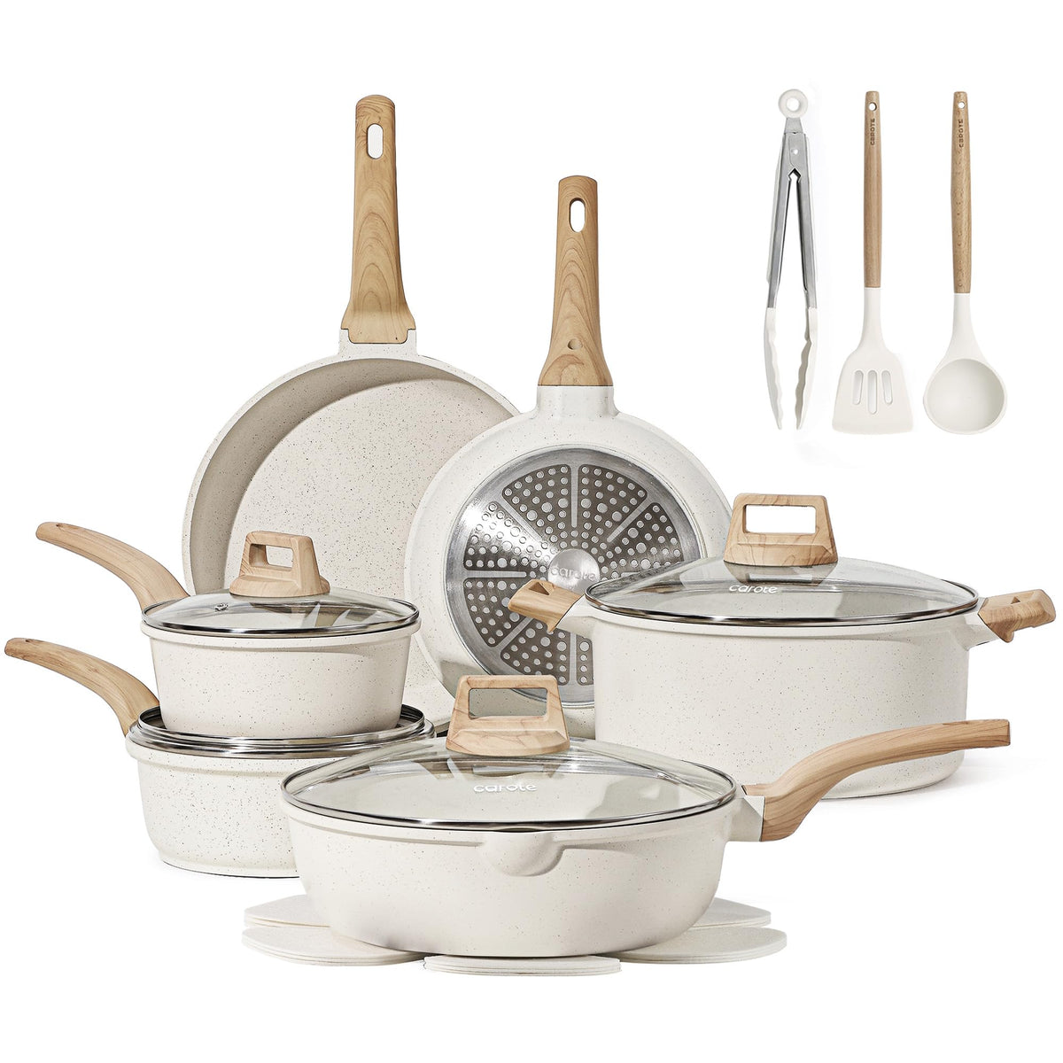 CAROTE 16-piece pots and pans set on stove, versatile for everyday family meals.