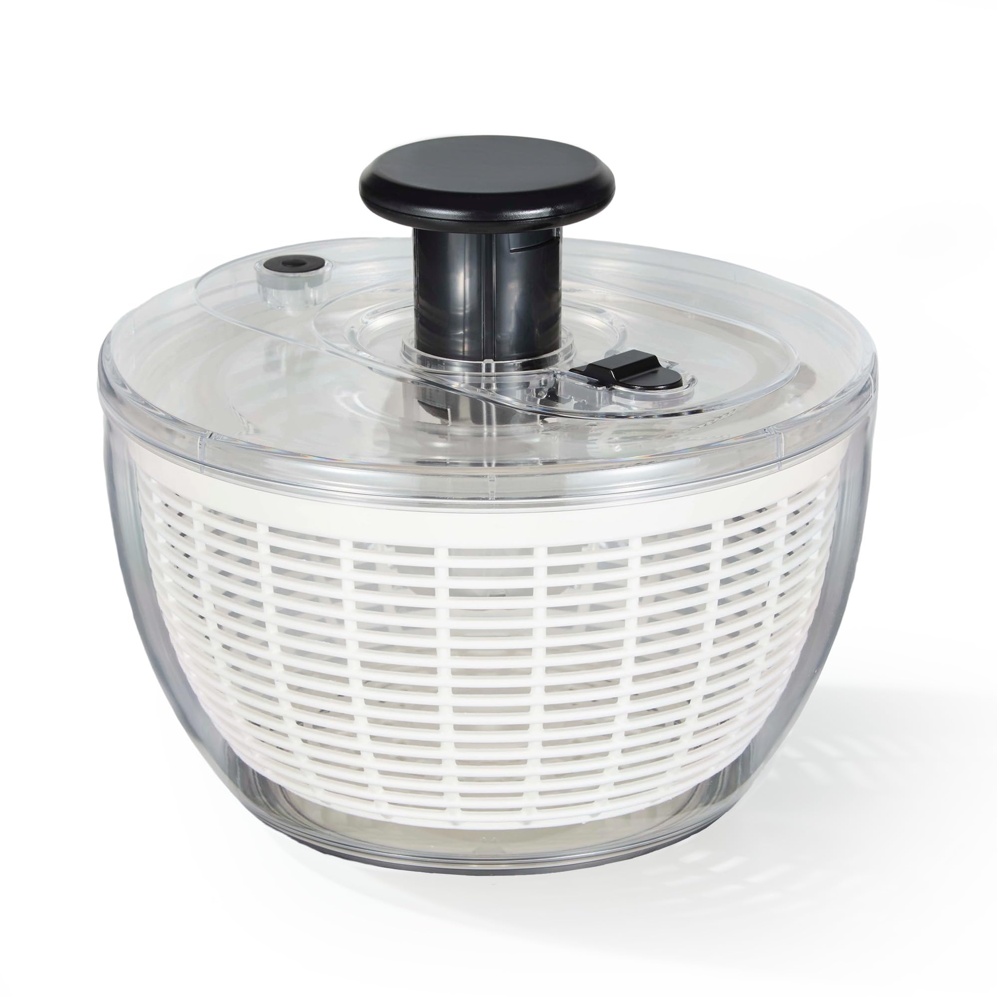 CAROTE 3.8 Qt salad spinner with transparent drum showing water droplets for thorough cleaning.