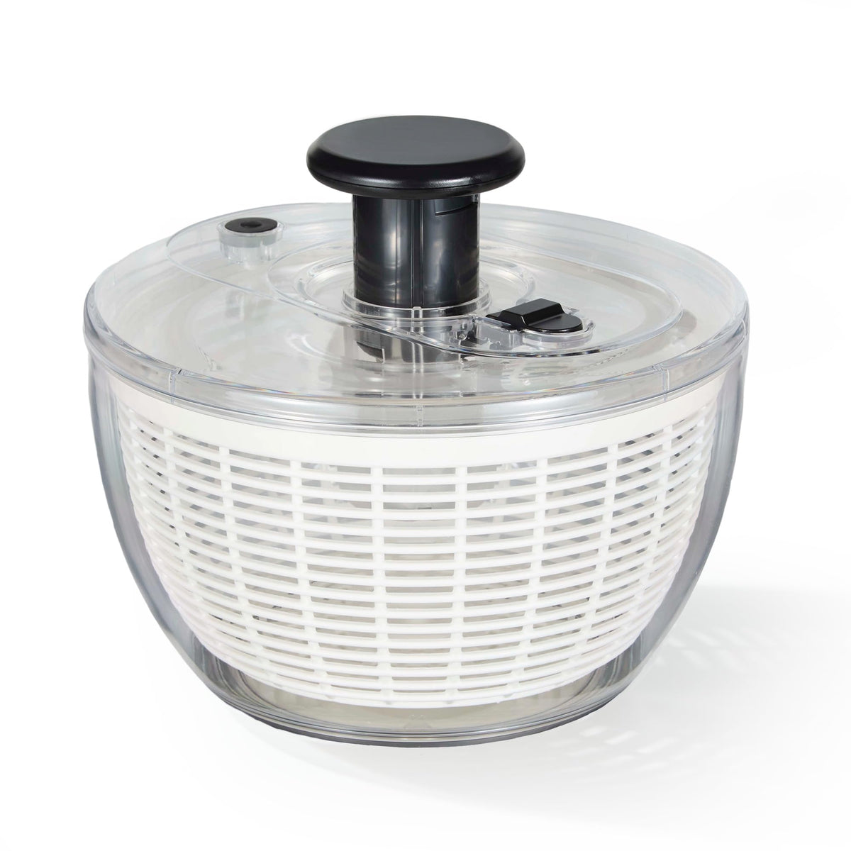 CAROTE 3.8 Qt salad spinner with transparent drum showing water droplets for thorough cleaning.