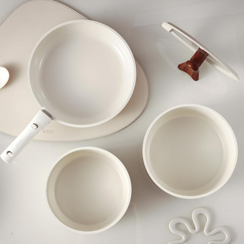 Carote detachable handle enables compact storage and multiple heat sources
