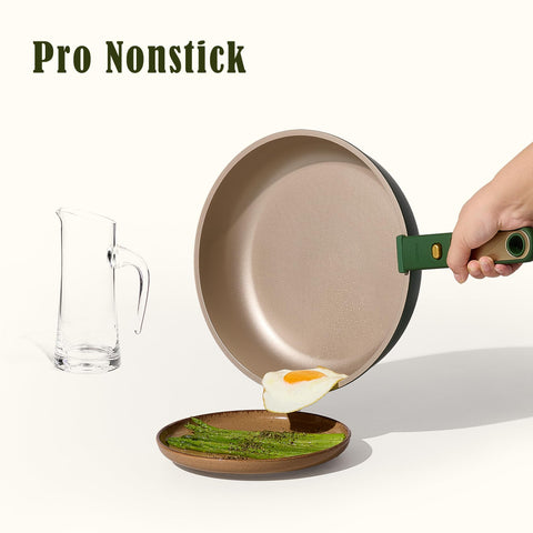 CAROTE Green&amp;Gold pots and pans on stove illustrating even heat distribution.